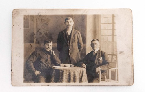 STARA FOTOGRAFIA - MĘŻCZYŹNI PRZY STOLE 1915