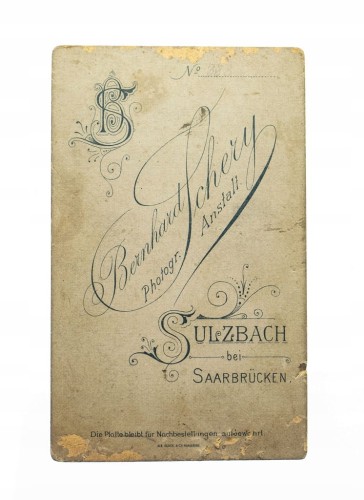 MĘŻCZYZNA W GARNITURZE - ATELIER SULZBACH