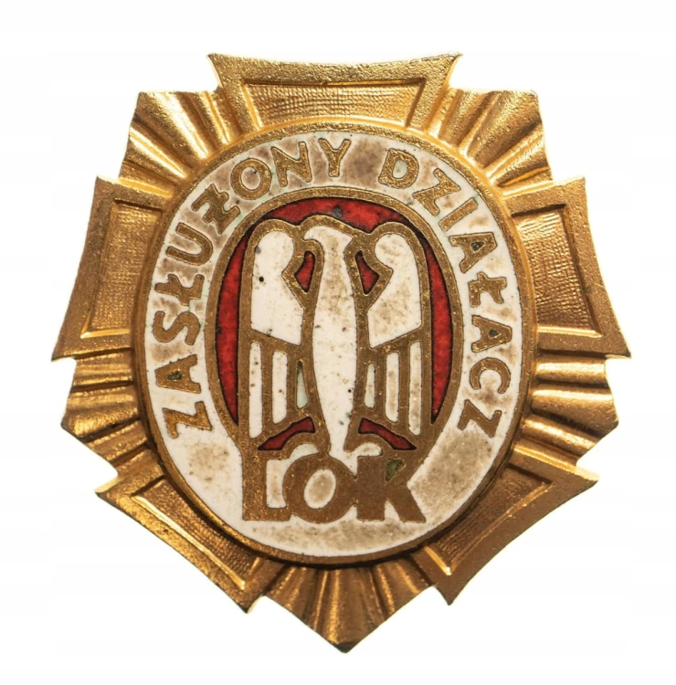 ZŁOTA ODZNAKA ZASŁUŻONY DZIAŁACZ LOK